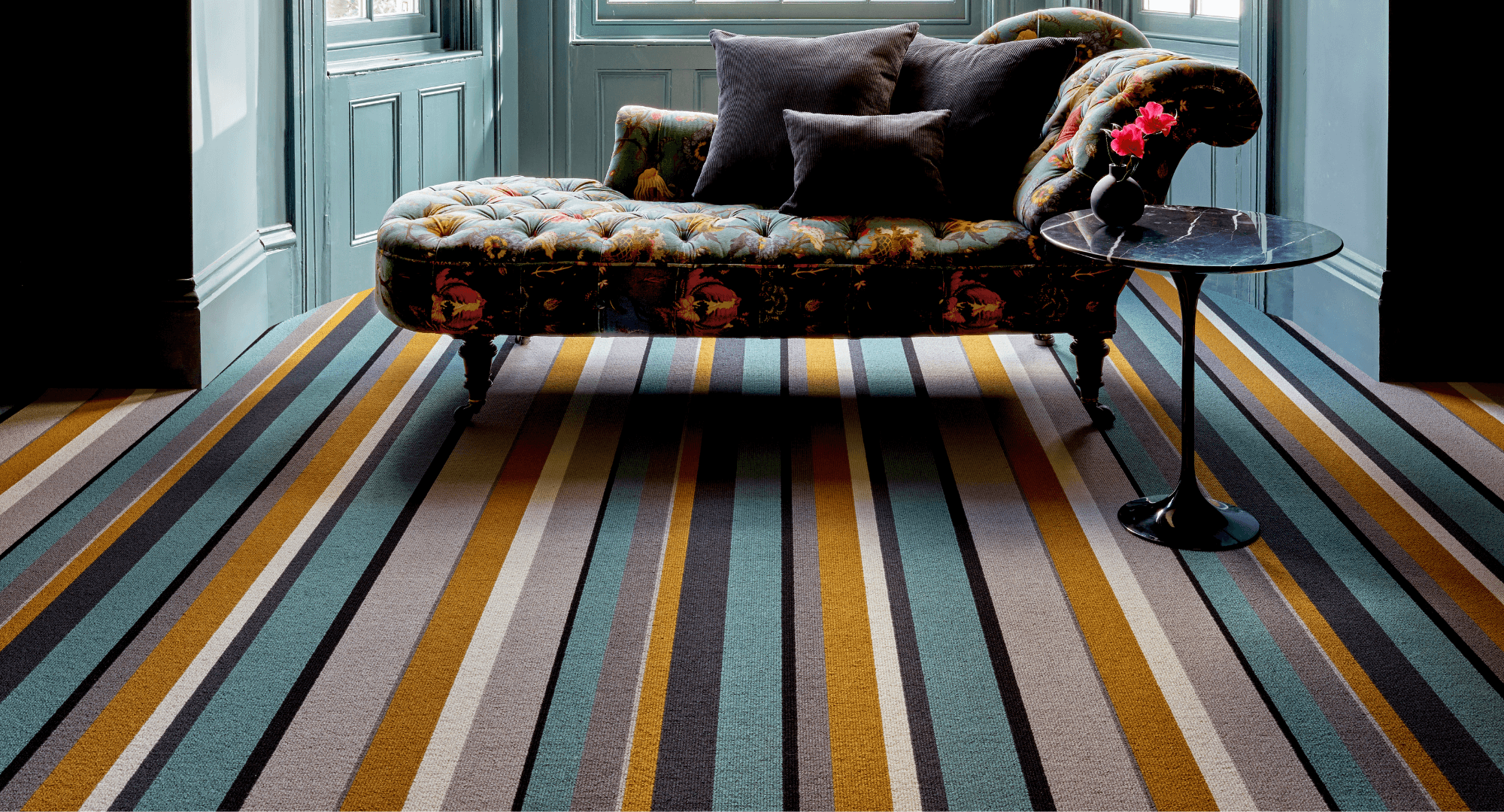 Beautifully patterned chaise lounge on stripy Crucial Trading carpet