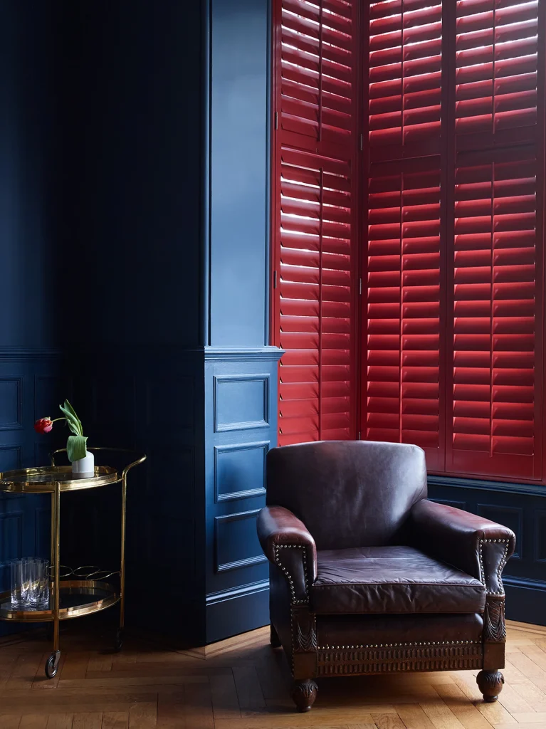 Paulownia custom red sitting room shutters