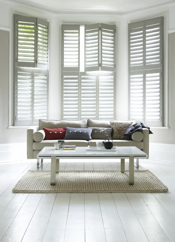 Paulownia tier on tier grey white lounge shutters